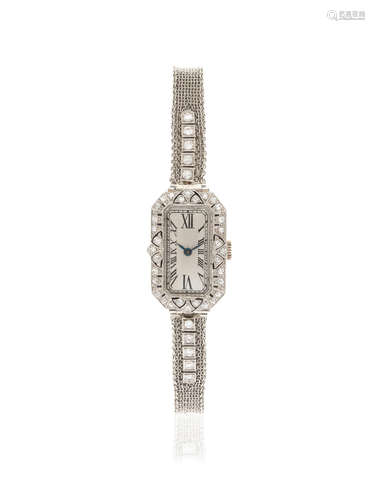 Circa 1930  A lady's white gold and diamond set manual wind Art Deco bracelet watch