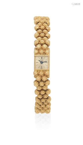 Ref: 1001 F22, Birmingham Import mark for 1967  Piaget. A lady's 18K gold manual wind bracelet watch