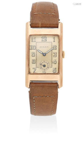 Circa 1938  Rolex. A 9K rose gold manual wind rectangular wristwatch