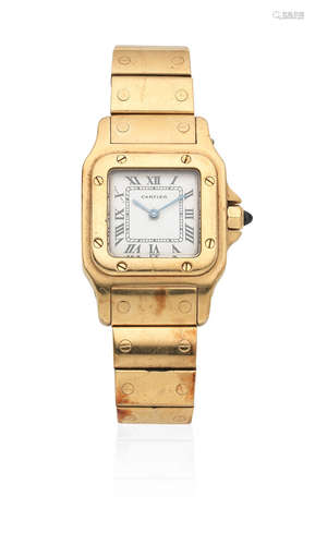 Santos, Circa 2000  Cartier. A lady's 18K gold quartz rectangular bracelet watch