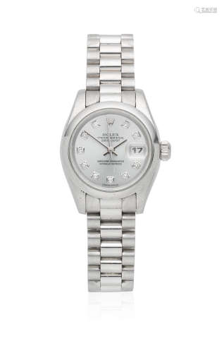 Datejust, Ref: 179166, Circa 2001  Rolex. A lady's platinum and diamond set automatic calendar bracelet watch