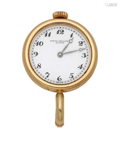 Ref: 4761, Sold 29th October 1990  Patek Philippe. An 18K gold quartz fob watch with Patek stamped brooch