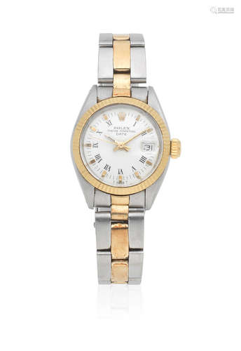 Date, Ref: 6916, Circa 1979  Rolex. A lady's stainless steel and gold automatic calendar bracelet watch