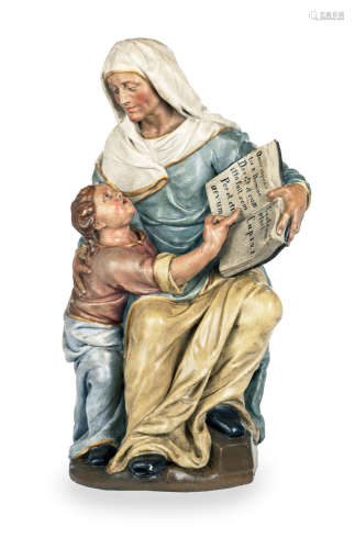 A large polychrome-painted and carved sculpture, probably St. Anne teaching the Christ Child to read, Southern European