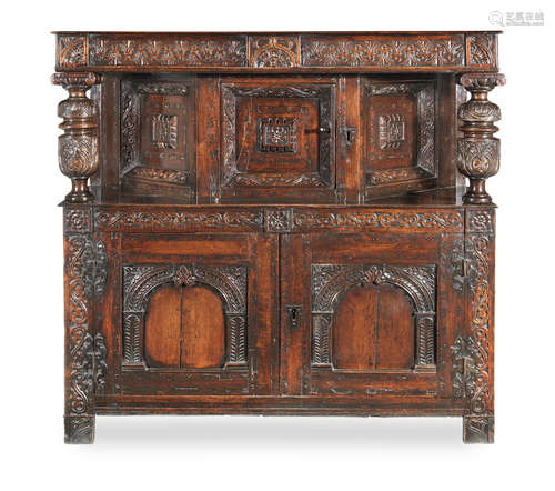 An Elizabeth I small joined oak, parquetry-inlaid and paint-highlighted court cupboard, West Country, circa 1590