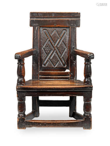 A Charles II joined oak panel-back open armchair, Scottish, circa 1680