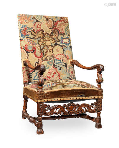 A joined walnut and needlework upholstered open armchair, Franco-Flemish, circa 1700