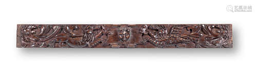 An Elizabeth I carved oak heraldic frieze or rail, circa 1600