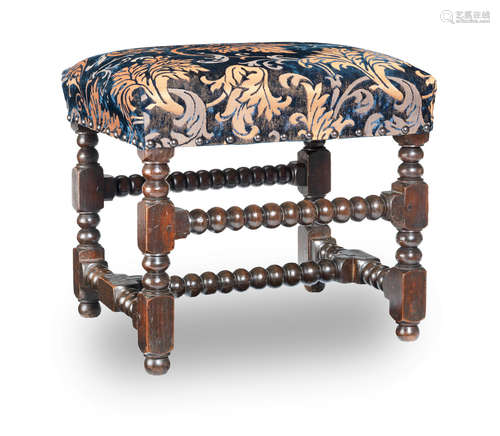 A Charles II joined oak and upholstered stool, circa 1680