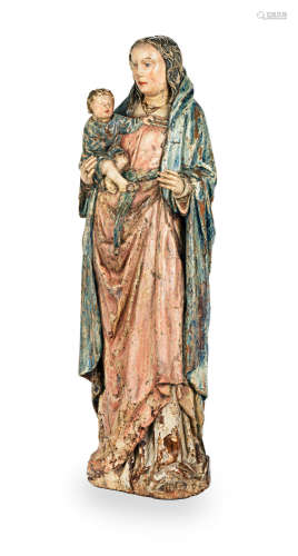 Probably 16th century A large carved and polychrome-decorated figure group, The Virgin & Child, Franco-Flemish