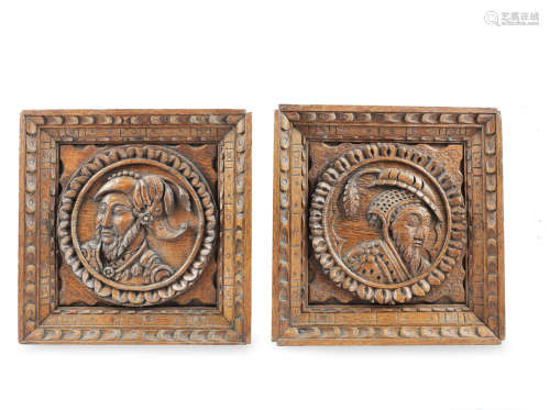 A pair of mid-16th century carved oak 'Romayne'-type panels, circa 1540