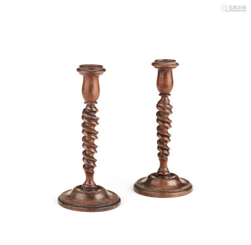 A pair of 19th century walnut candlesticks, English