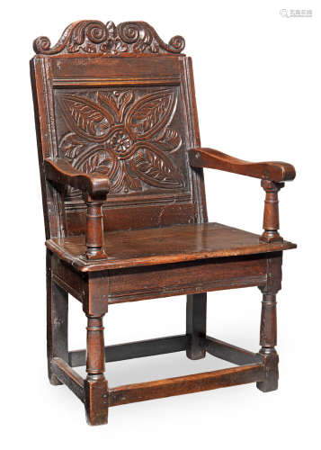 A Charles I joined oak panel-back open armchair, Gloucestershire, circa 1640
