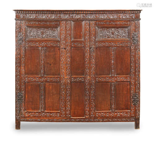 An early 17th century joined oak livery/press cupboard, West Country, circa 1620-40