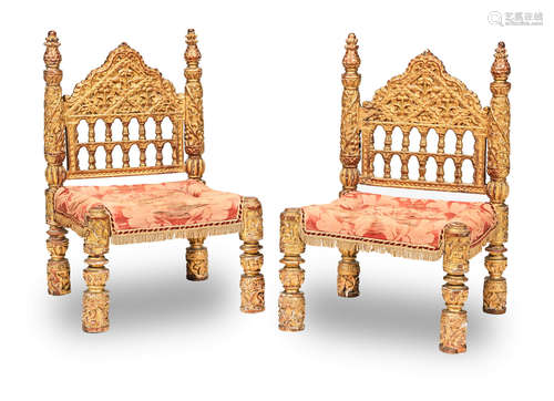 17th century or possibly 16th century An interesting pair of carved giltwood low chairs, Indo-Portugese