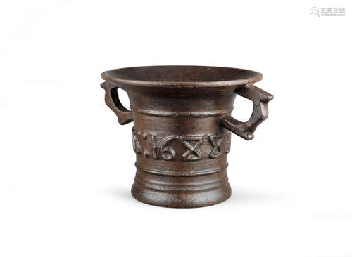 An important and rare James II/William & Mary cast-iron mortar, dated 1688, probably Shropshire or West Midlands