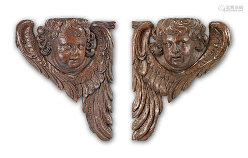 An impressive pair of late 17th century carved oak architectural spandrels, Flemish/Dutch, circa 1670