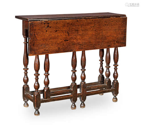 A joined oak folding writing table, English, circa 1690-1710