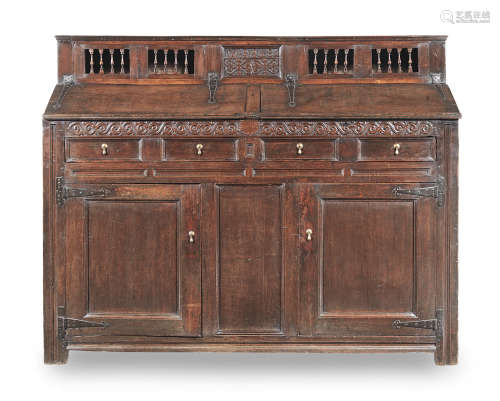 A rare James II joined oak and fruitwood clerks's cupboard, Lake District, dated 1686