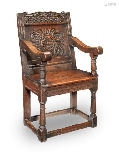 A Charles I joined oak panel-back open armchair, Gloucestershire, circa 1630