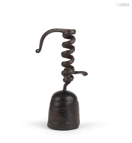 An unusual wrought iron and oak candlestick, possibly English, probably circa 1800