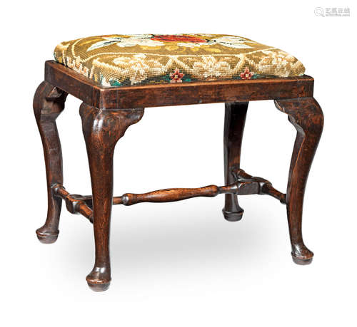 A George II joined oak, ash, beech and upholstered stool, circa 1740