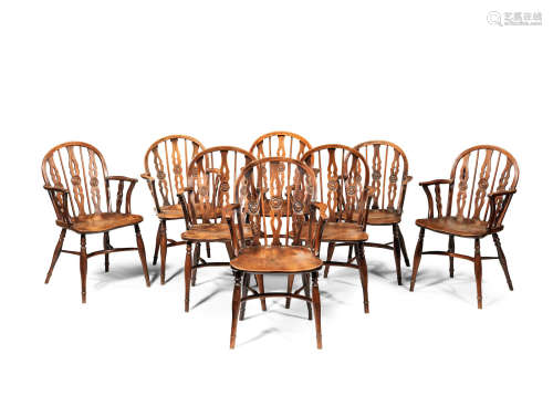 In the manner of the Prior family workshop A matched set of eight early 19th century yew, elm and beech Windsor armchairs, Thames Valley, circa 1820-40