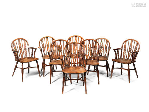 In the manner of the Prior family workshop A matched set of eight early 19th century yew, elm and beech Windsor armchairs, Thames Valley, circa 1820-40