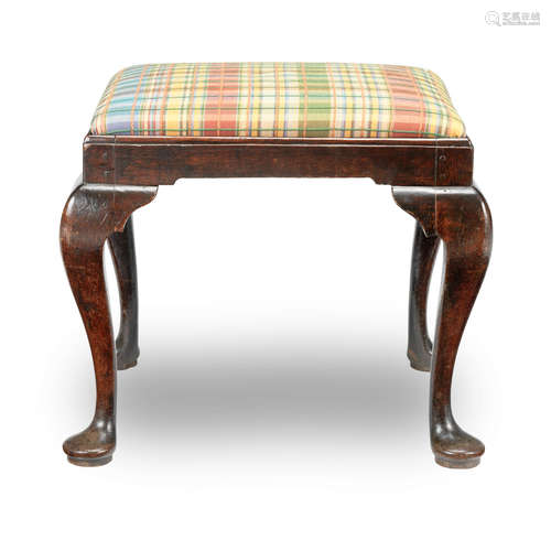 A Goerge II joined oak and upholstered stool, circa 1740