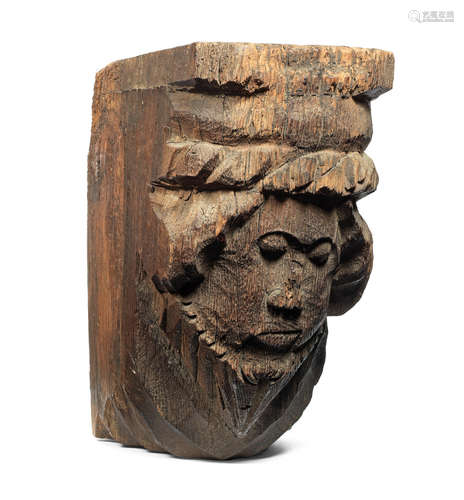 A mid-15th century oak figural carved corbel, English, circa 1460