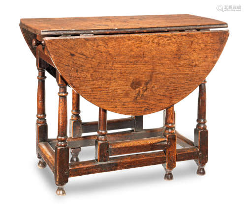 An early 18th century joined oak gateleg occassional table, English, circa 1700-20