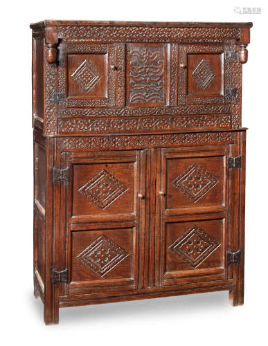 A joined oak court cupboard, with a rare 'concealed' drawer, Lancashire, circa 1700