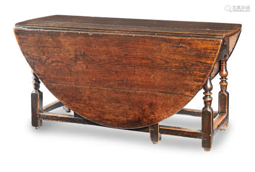 A William & Mary large joined oak and walnut gateleg dining table, circa 1690