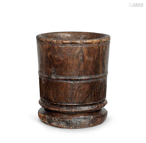 A late 17th century/early 18th century turned lignum vitae mortar, English, circa 1700