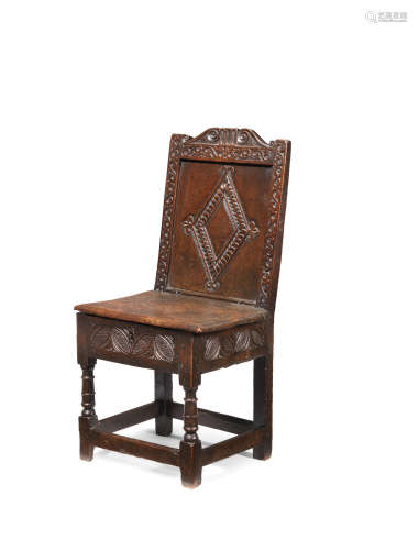 A rare Charles I joined oak closed-back and box-seat chair, West Country, circa 1640