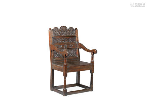 A Charles II joined oak triple panel-back open armchair, Lancashire, circa 1670