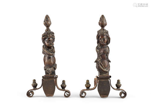A small pair of early 18th century bronze, brass and iron andirons, Venetian
