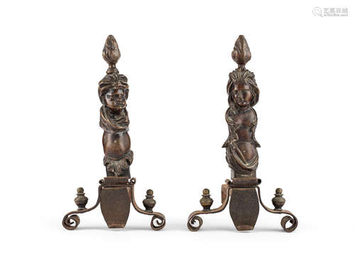 A small pair of early 18th century bronze, brass and iron andirons, Venetian