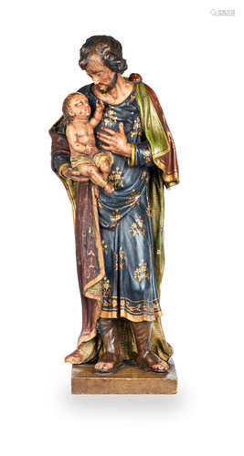 A late 18th/early 19th century parcel-gilt and polychrome-painted sculpture, possibly St Joseph, Southern European