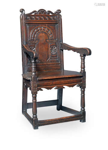 A Charles I joined oak panel-back open armchair, Gloucestershire, circa 1640