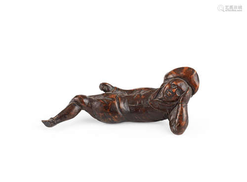 An early to mid-18th century small 'fruitwood' figural carving, English, probably North Country