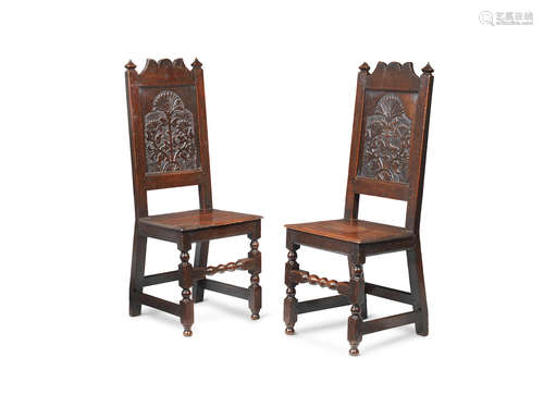 An interesting pair of Charles II joined oak backstools, Lancashire, circa 1680