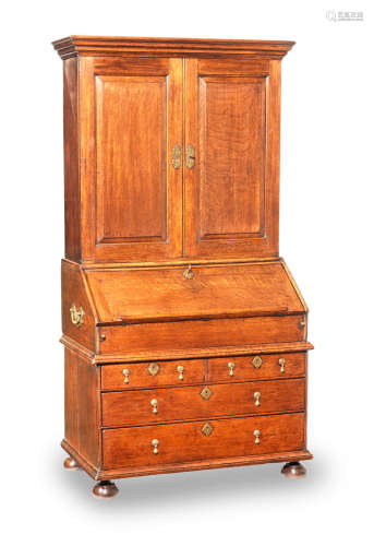 An early 18th century oak bureau bookcase, English, circa 1730