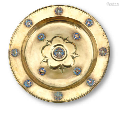 A mid-16th century brass alms dish, Nuremberg, circa 1550, later mounted with enamelled roundels