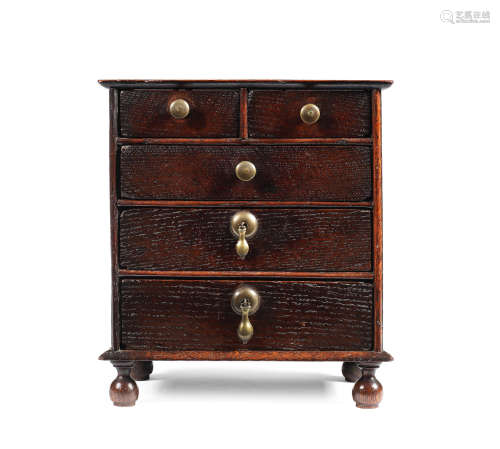 A miniature oak chest of drawers, English, circa 1700