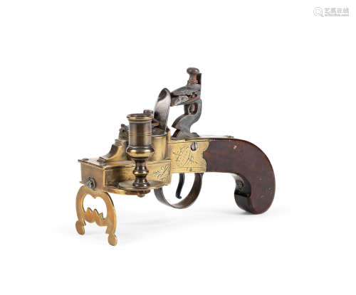 Signed 'I. GILL', possibly for gunsmith John Gill of London (fl. 1750 - 1808)  A late George III brass, steel and walnut tinder pistol, or table 'strike-a-light', English, circa 1800