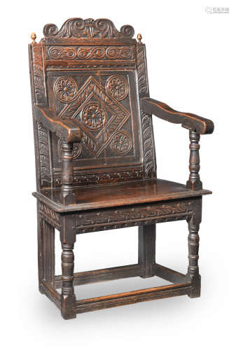 A Charles I joined oak panel-back open armchair, Gloucestershire, circa 1630-40
