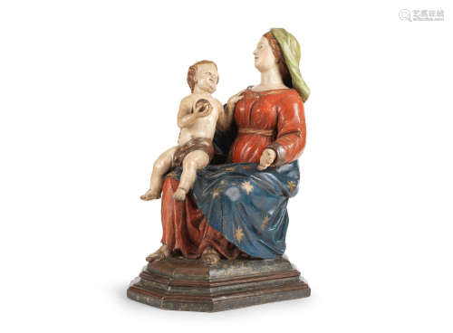 A late 18th/early 19th century polychrome-decorated carved sculpture, The Virgin & Child, South European