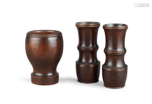 A pair of 19th century turned lignum vitae spill vases, English