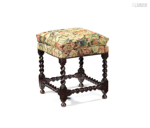 A Charles II joined oak and upholstered stool, circa 1680